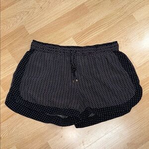 Jennifer Lopez Black and White Shorts with Curved Hem. Comfy Monochrome